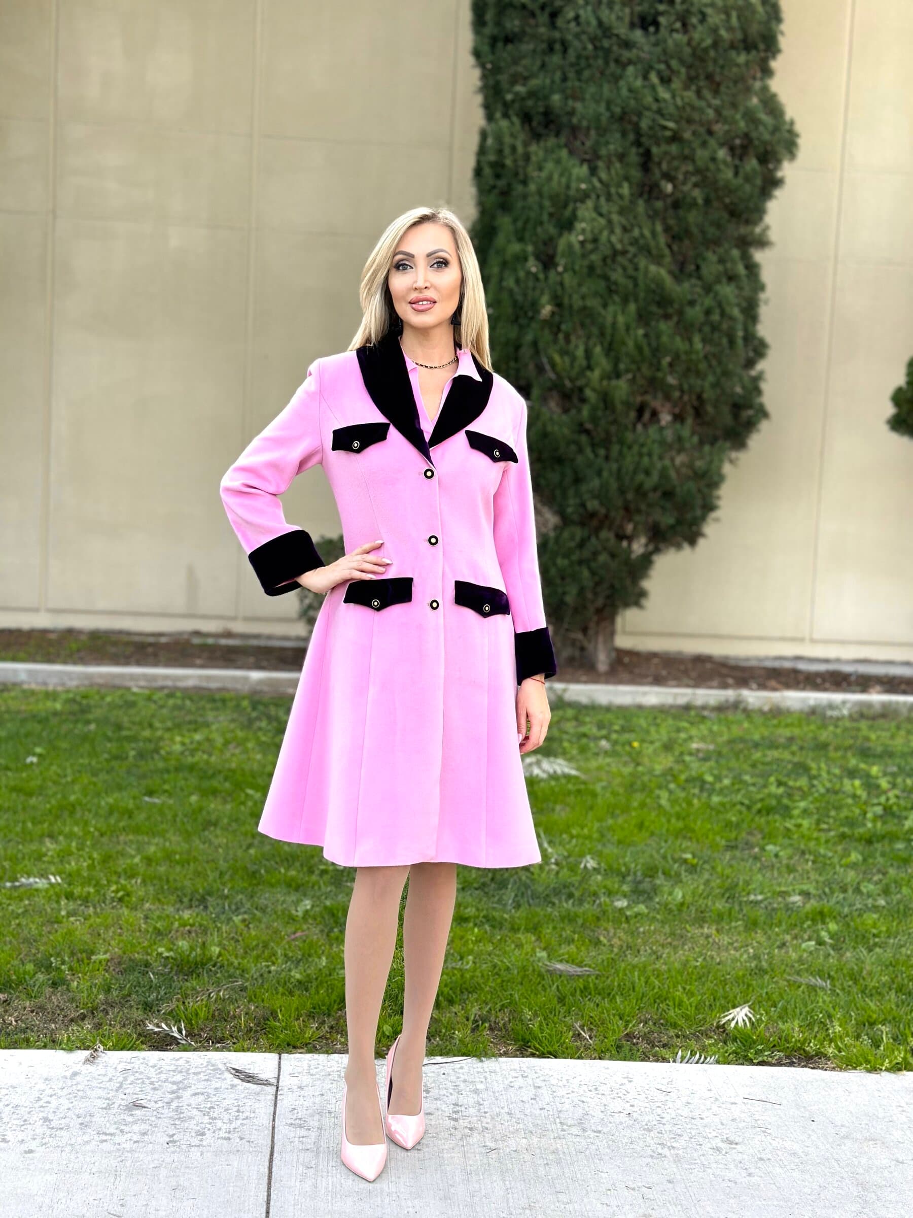 Veronika Mindal in a pink coat with velvet trim